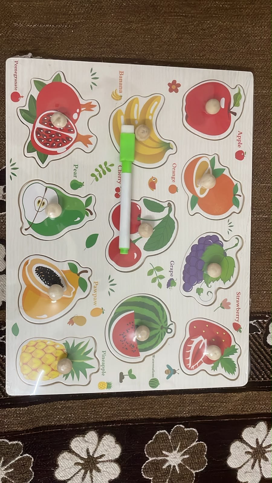 Educational toy image showing a lightweight and travel-friendly wooden fruit puzzle board with whiteboard, ideal for indoor play, preschool learning, and gifting.