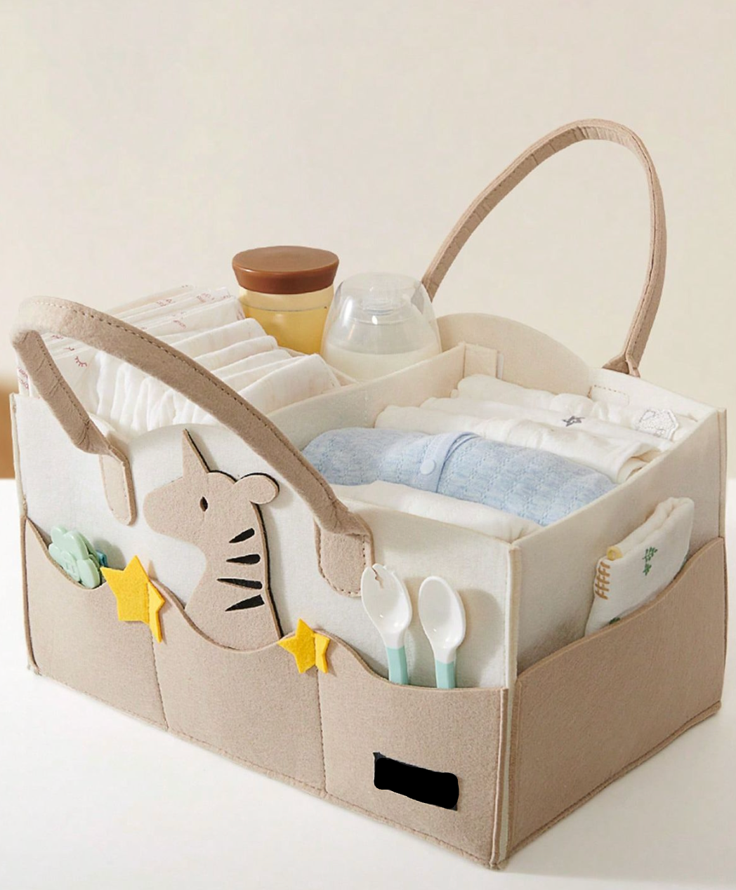 Spacious Baby And Fur Nursery Storage Caddy holding baby diapers, bottles, and toys – portable and lightweight design