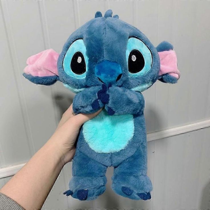 Baby peacefully sleeping with Baby And Fur musical breathing plush doll soothing sleep toy