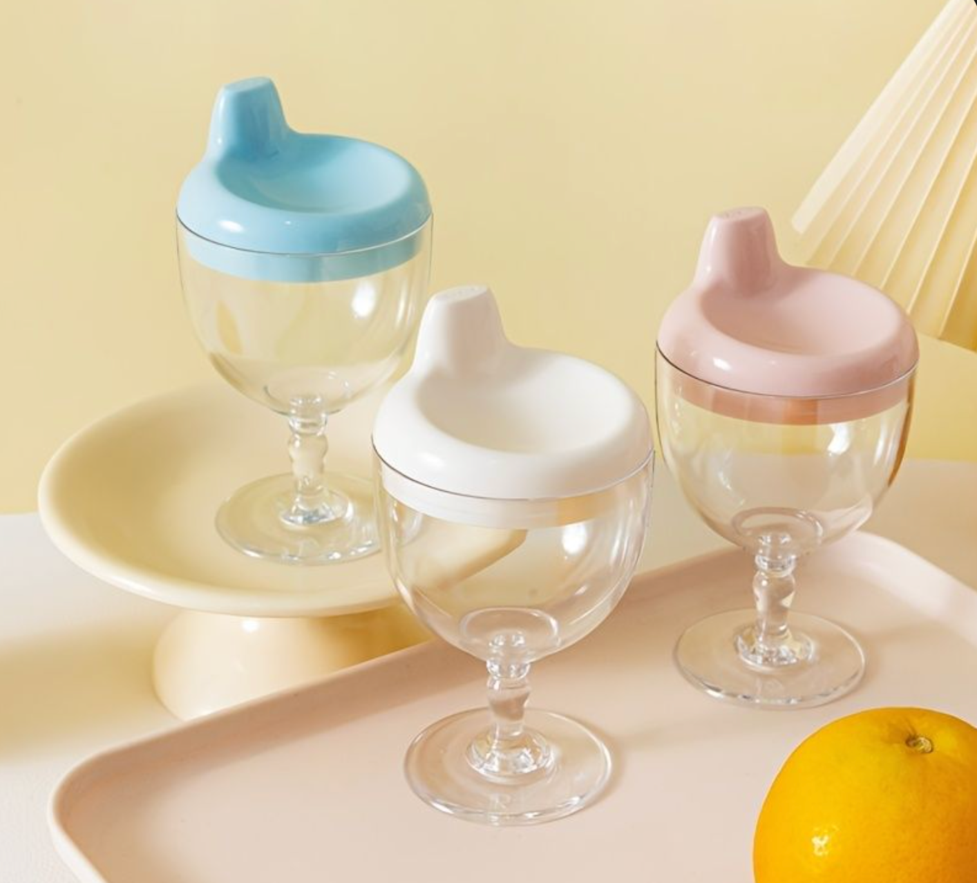 Toddler drinking from Baby And Fur Goblet Sippy Cup – safe spill-proof baby cup encouraging independent drinking