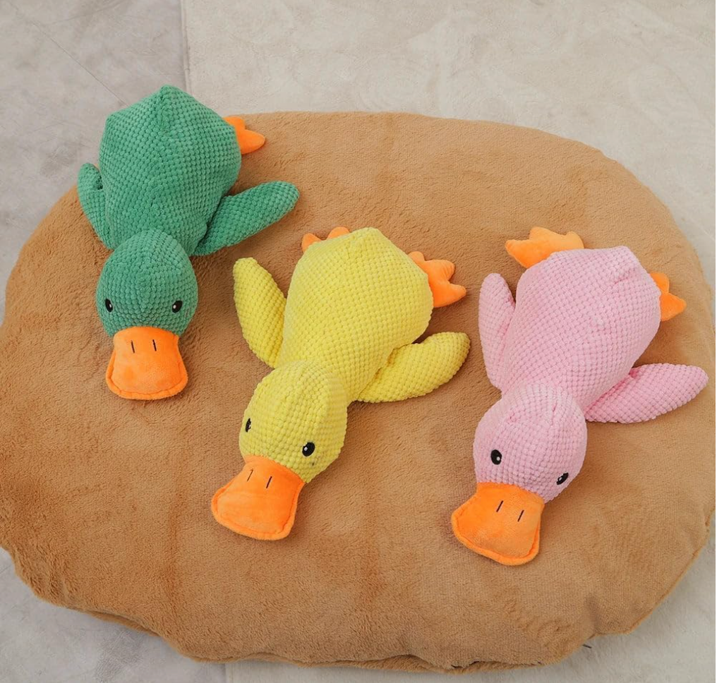 Hanging squeaky plush dog toy by Baby and Fur to train foraging skills, encourage jumping and biting, reduce laziness, and keep pets engaged indoors